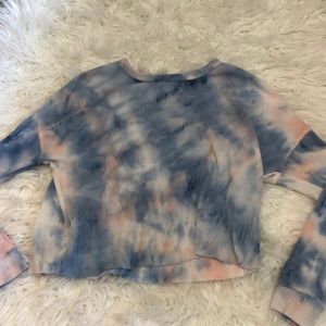 Light blue, light pink, and white tie-dye sweater